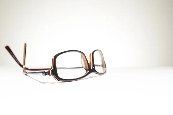 Reading glasses on white background — Stock Photo, Image