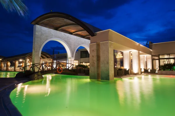 Night pool side of rich hotel