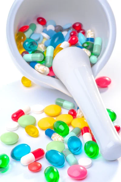 Mortar and pestle with pills — Stock Photo, Image