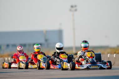 Kart pilots competing clipart