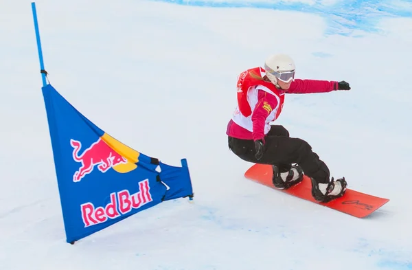 CORTINA D 'AMPEZZO, ITALY - DECEMBER 22: Unknown snowboarder performs during the European Cup Snowboardcross on December 22, 2012, Cortina d' Ampezzo, Italy — стоковое фото