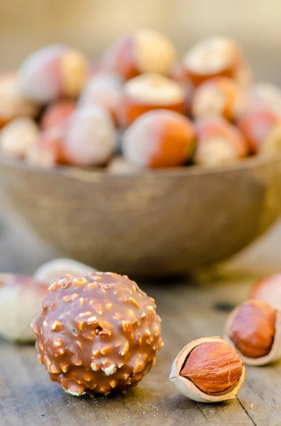 Hazelnuts and chocolate — Stock Photo, Image