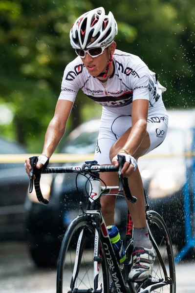 Cyclists from various teams cycle — Stock Photo, Image