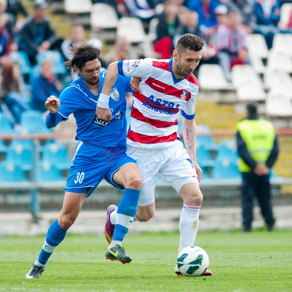 Futbolcuların gerçekleştirir — Stok fotoğraf