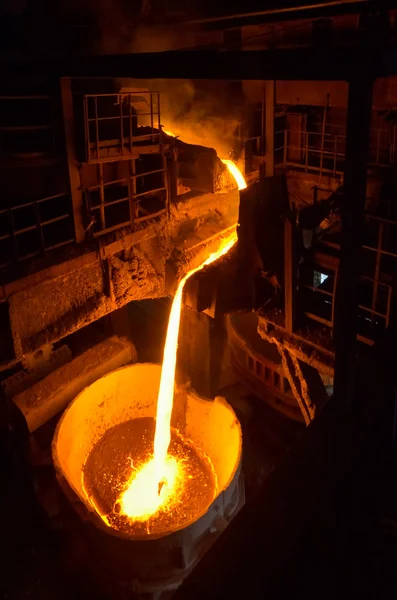 Liquid iron inside of plant and trains — Stock Photo, Image