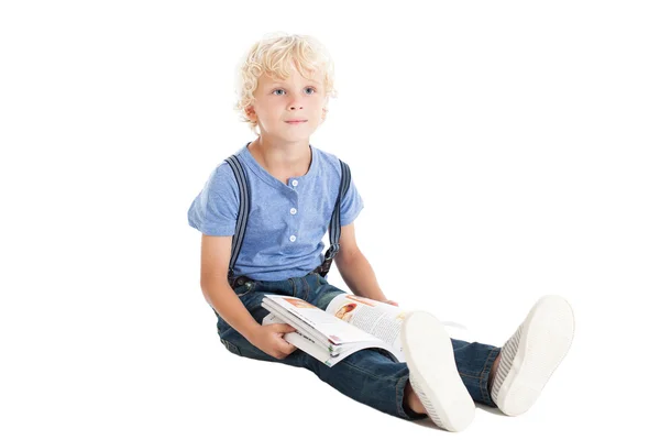 Menino bonito com livro — Fotografia de Stock