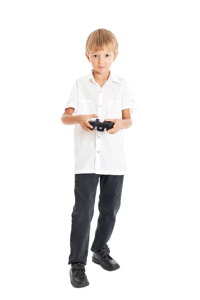 Blond boy spela ett datorspel — Stockfoto
