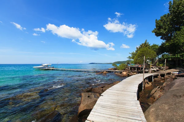 Wooden bridge on the beach — Stock Photo, Image