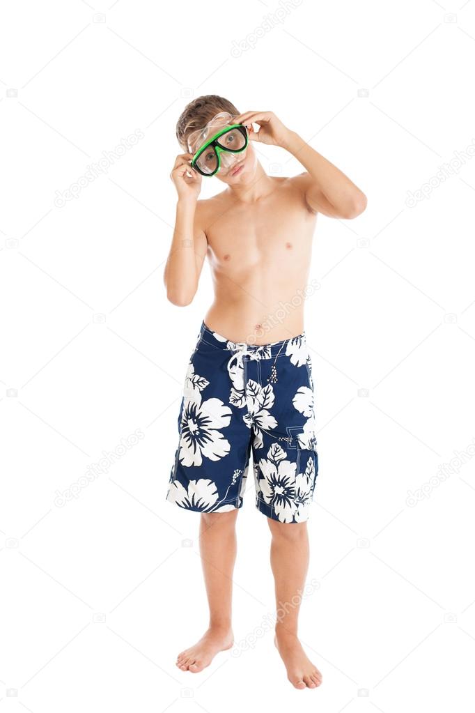 Boy wearing swimming shorts