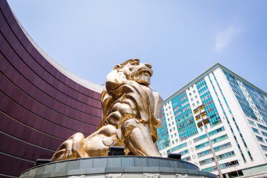 Golden lion statue in Macau clipart