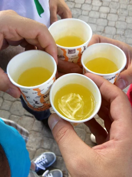 Three friends toasting soft drinks — Stock Photo, Image
