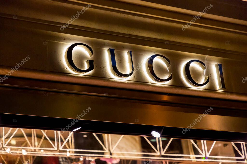 Paris, France - January 20, 2022: Signboard and facade of the Gucci Paris store in Galeries Lafayette, Paris, France