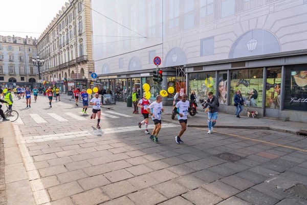 stock image Turin, Italy - March 27, 2022: Competitors running at the Turin Half Marathon held on March 27, 2022 in Turin, the capital of Piedmont, Italy.