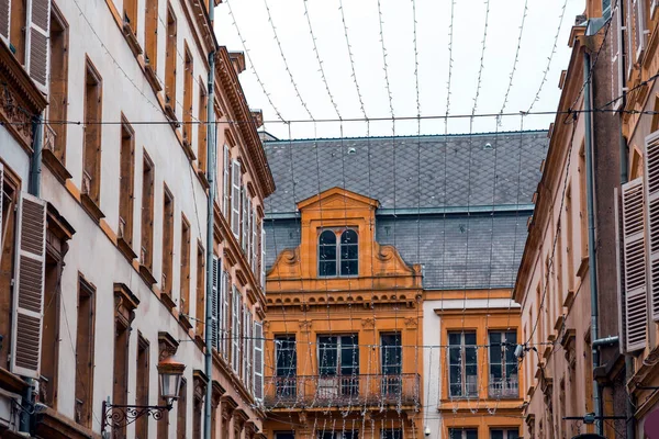 Street view and typical french buildings in the city of Metz, France.