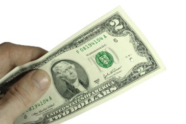 bir deste kağıt dolar ABD beyaz bac üzerinde tutan el mans