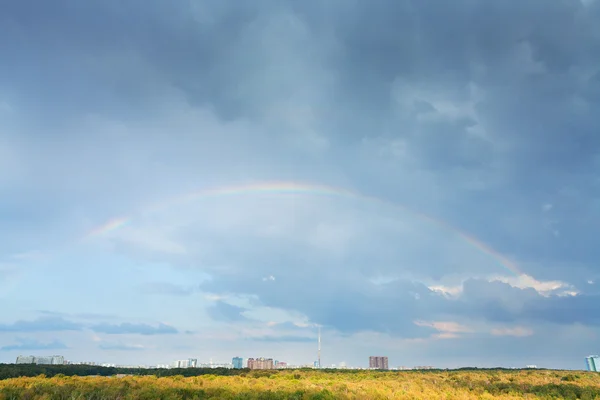 Rainbow under autumn urban park — Stock Photo, Image