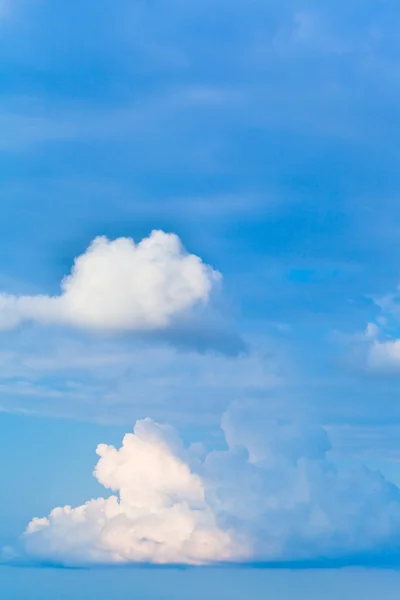 Two white cumulus clouds — Stock Photo, Image