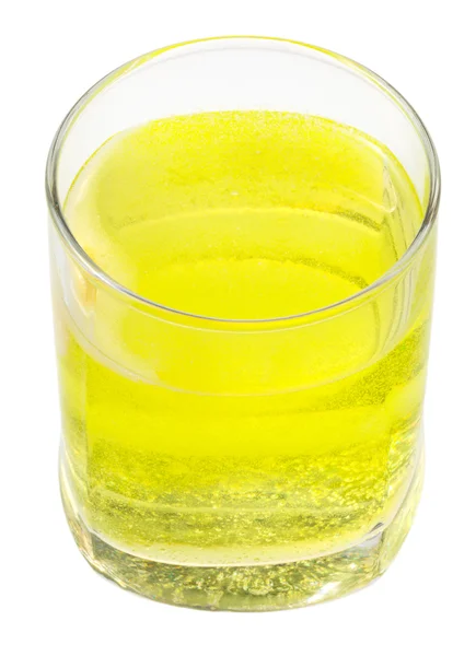 Glass of yellow carbonated water with vitamin C — Stock Photo, Image