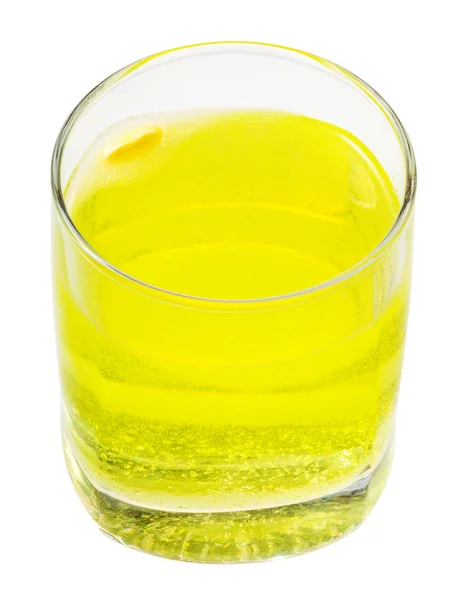 Pohár sárga szénsavas víz a a C-vitamin — Stock Fotó