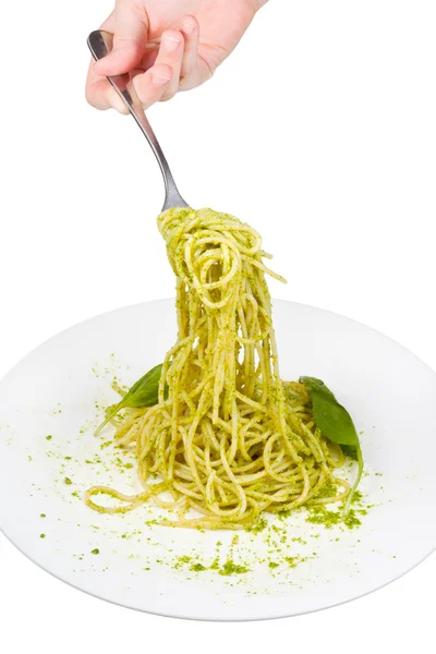 Comer espaguetis aislados sobre fondo blanco — Foto de Stock