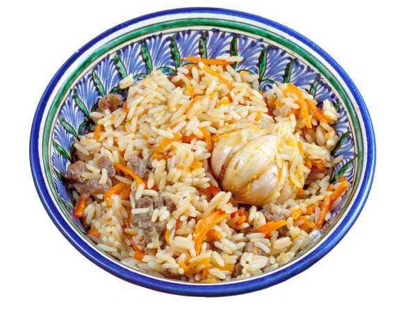 Tradycyjne azjatyckie pilaw z główki czosnku w ceramicznej miski — Zdjęcie stockowe