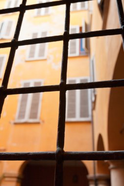 Window and iron bars in italian home clipart