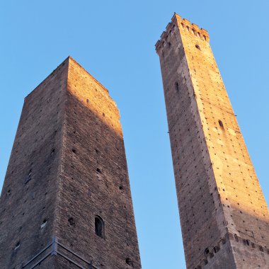 Due Torri - symbol of city under blue sky in Bologna clipart