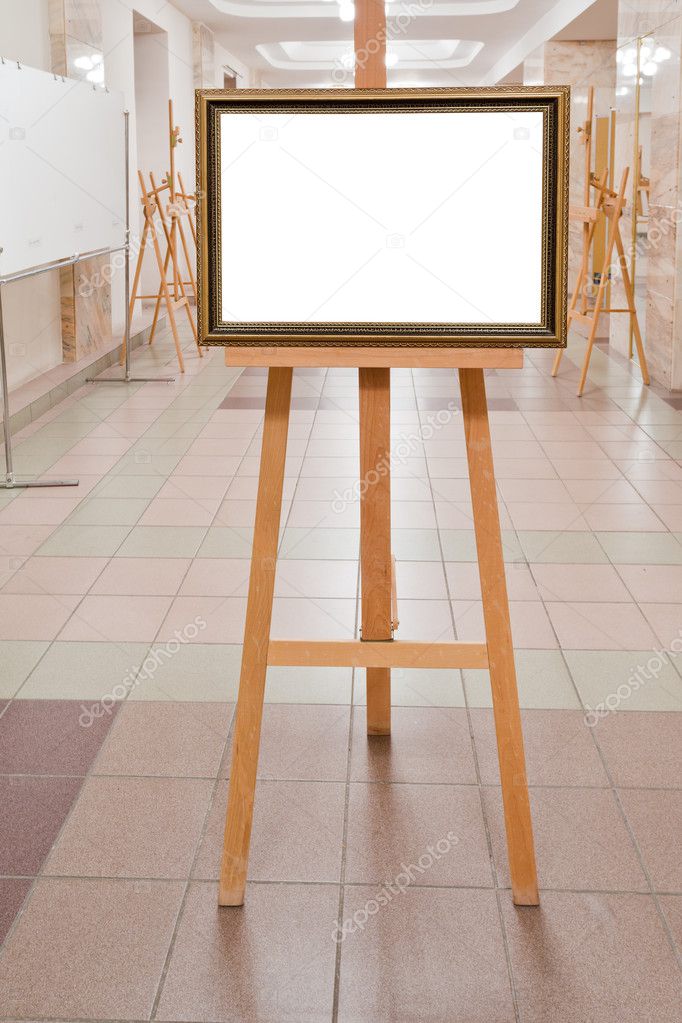 Picture frame on easel in art gallery