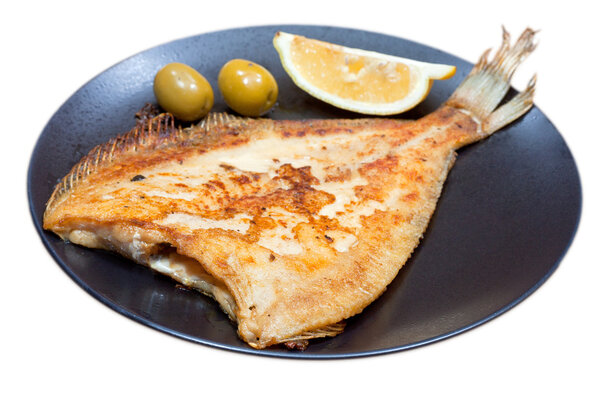 Fried sole fish on white background