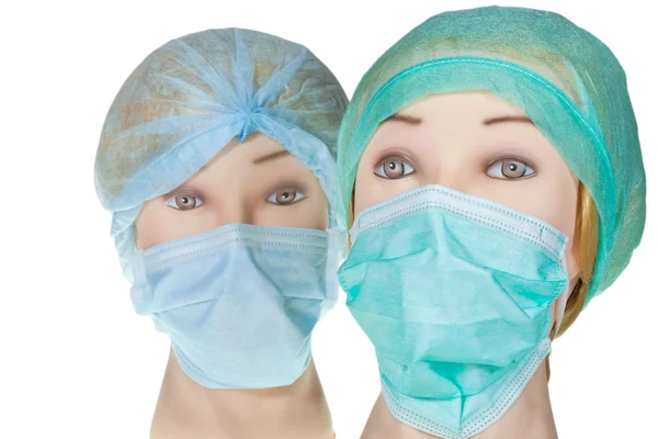 Testa di medico fittizio con cappuccio e maschera chirurgica tessile — Foto Stock