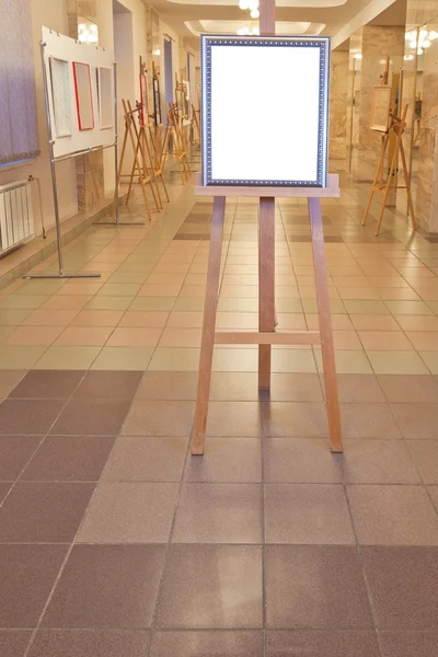 Silver picture frame easel in art gallery hall — Stock Photo, Image