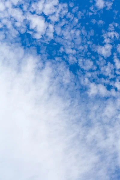 Autumn sky with one big and many small clouds — Stock Photo, Image
