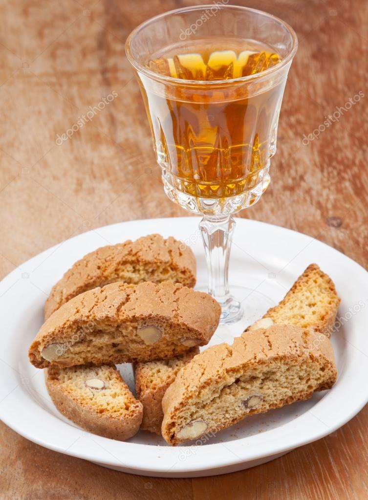 Sweet white wine and italian almond cantuccini on table
