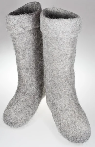 Par de botas de feltro de altura no joelho — Fotografia de Stock
