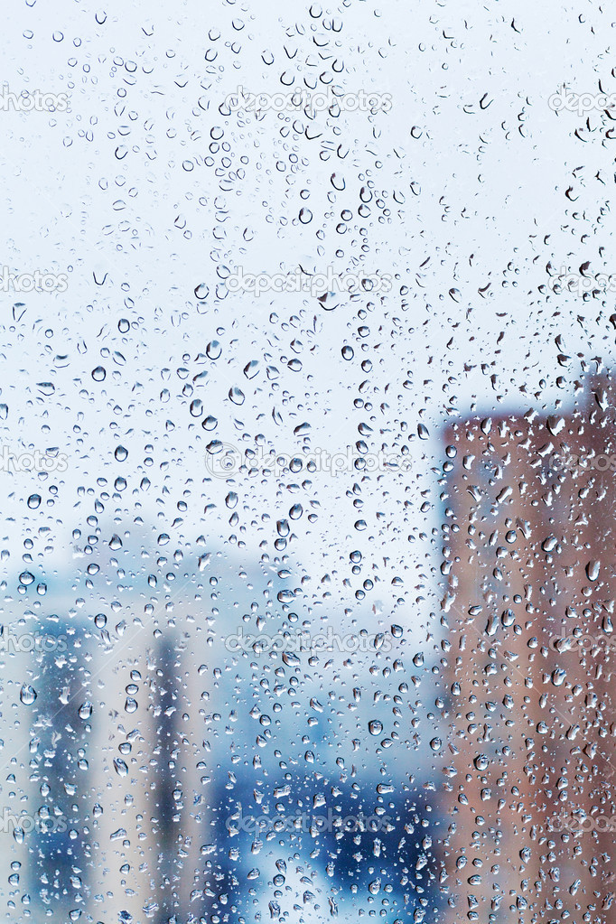 raindrops on home glass window