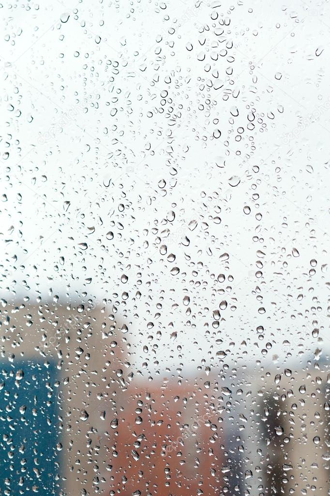 raindrops on home glass window