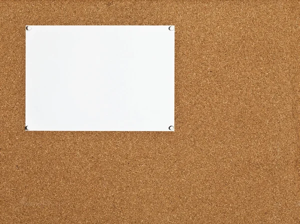 Sheet of paper on cork board — Stock Photo, Image