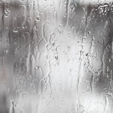 rain streams on window