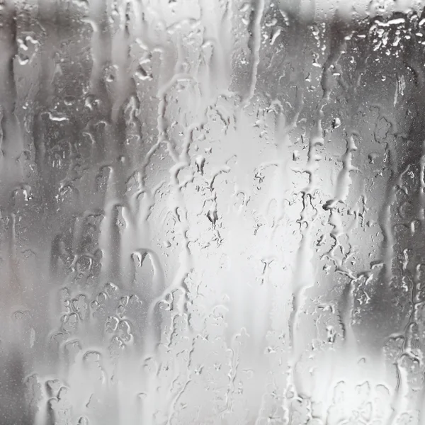Córregos de chuva na janela — Fotografia de Stock