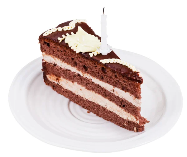 Porción de pastel de chocolate con vela —  Fotos de Stock