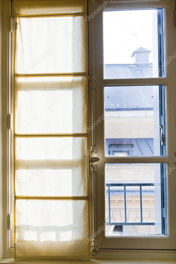 textile drapes on sunny window