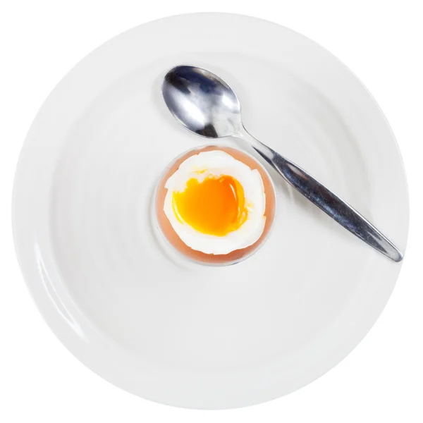 Soft boiled egg in egg cup on white plate — Stock Photo, Image