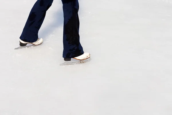 Skates on outdoor skating-rink — Stock Photo, Image