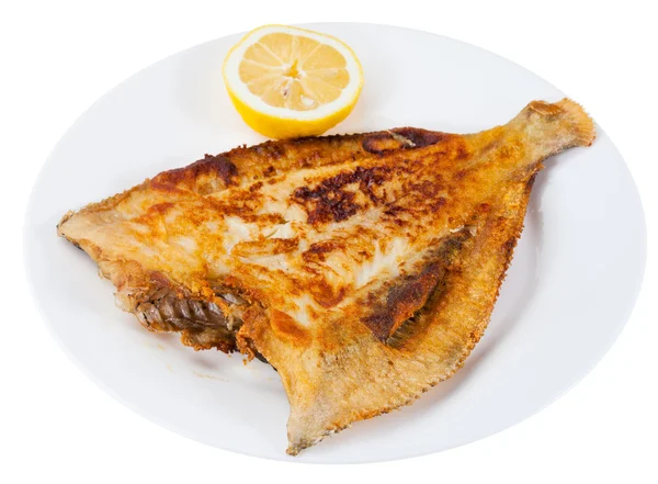 Smažené ryby jediným na bílé desce — Stock fotografie