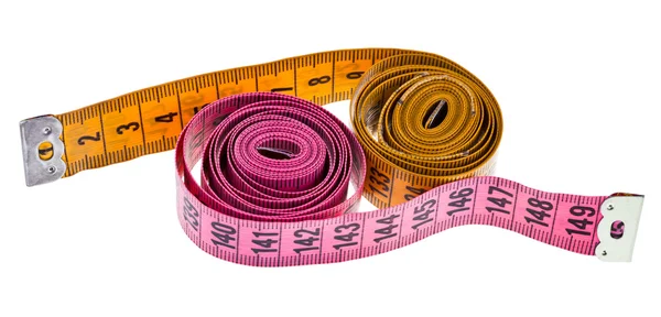 Yellow and pink measure tapes — Stock Photo, Image