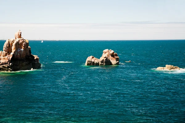 Granit sten i Atlanterhavet - Stock-foto