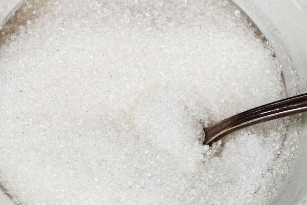 Sugar in bowl close up — Stock Photo, Image
