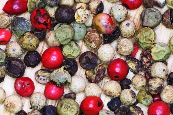 Different peppercorns close up — Stock Photo, Image