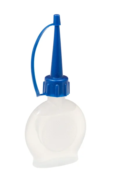 Small plastic oiler with blue cap — Stock Photo, Image