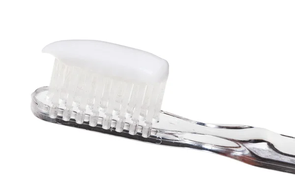 Toothbrush and toothpaste from tube — Stock Photo, Image